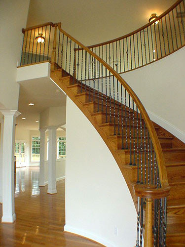 A Beautiful Bending Stairway Deserves a Beautiful Bending Handrail